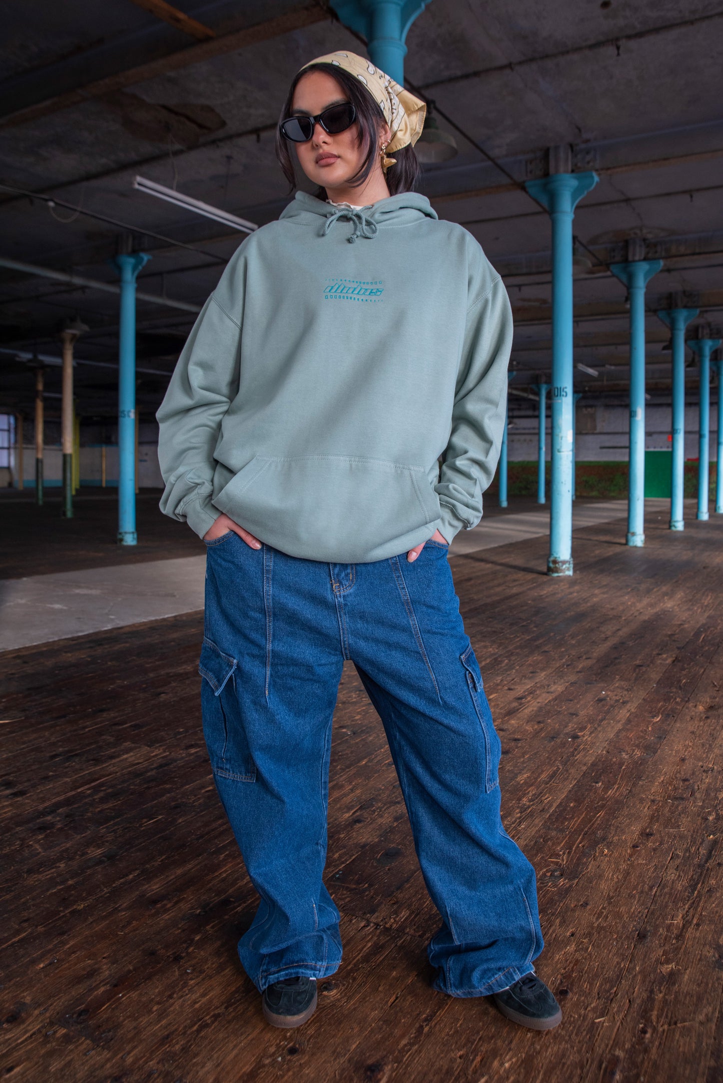 Unisex Hoodie in Dusty Green with Futuristic Logo Embroidery