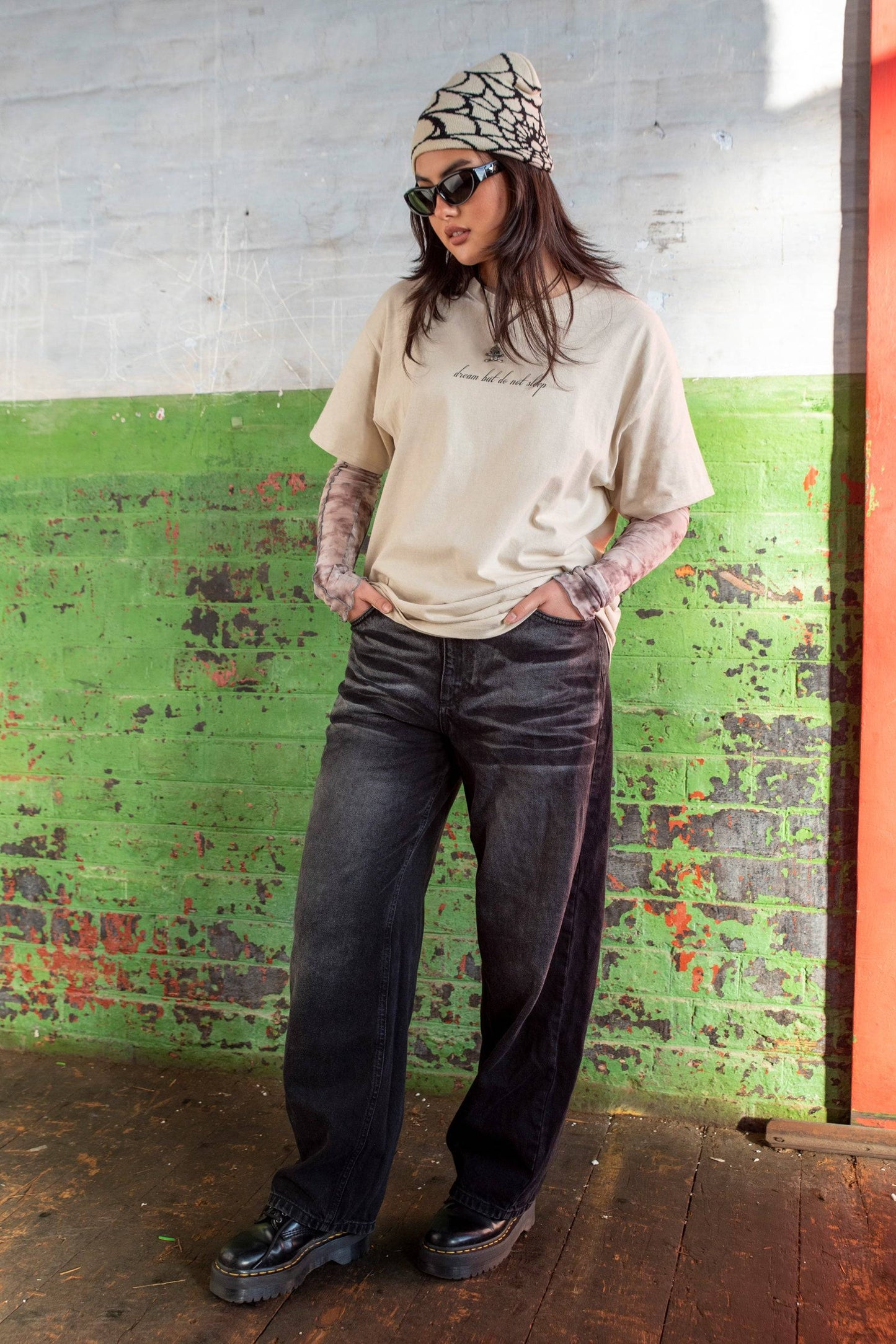 Relaxed fit Sand T-shirt Dragon Print - Chinese Dragon T-shirt styled with dark jeans and layered sleeves, ideal for streetwear fashion.