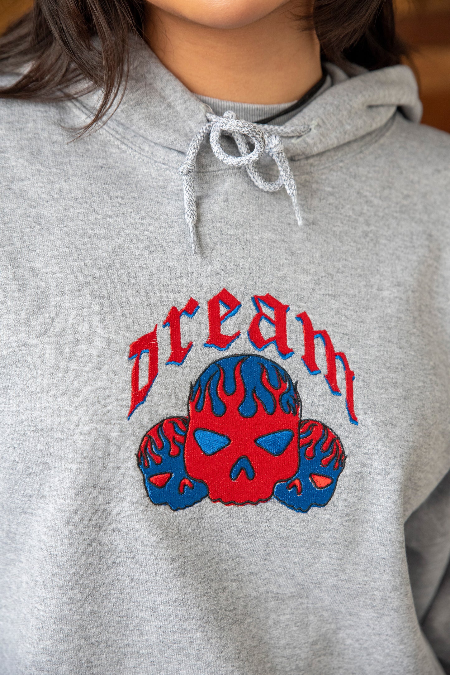 Hoodie in Heather Grey With Flaming Skull Embroidery