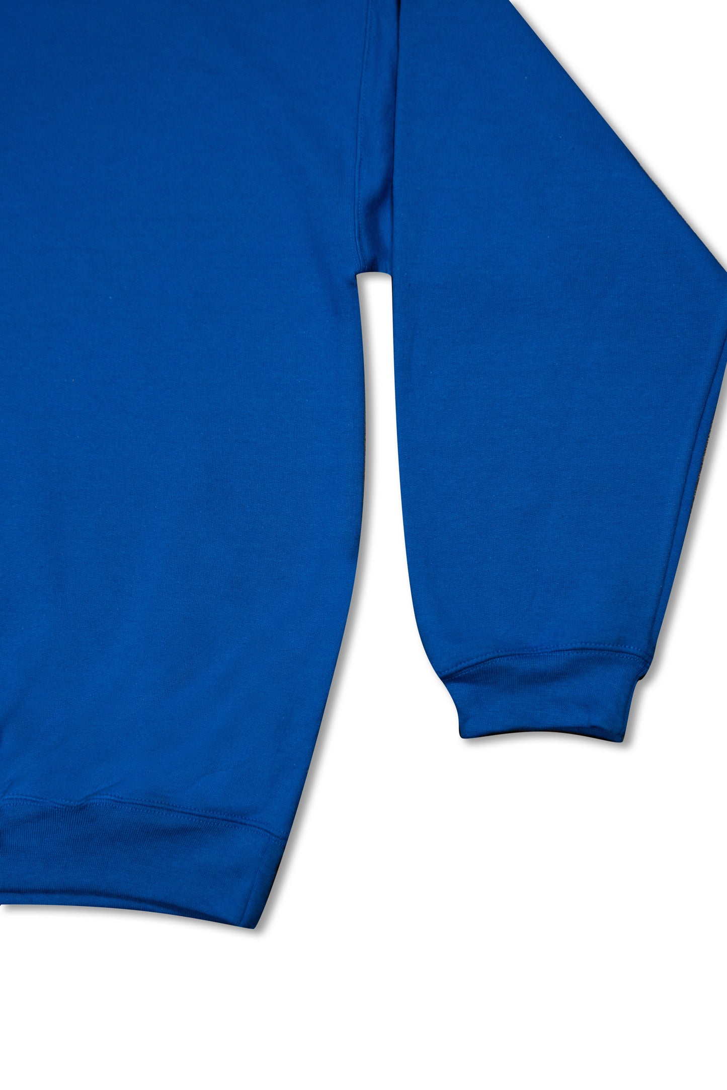 Cuffed sleeve and hem of royal blue 1/4 zip sweatshirt, highlighting the heavyweight cotton fabric and relaxed fit for everyday wear.