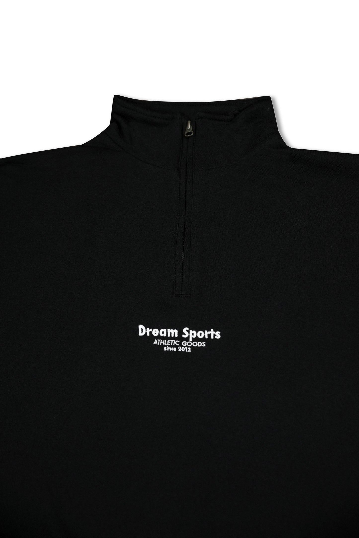 Close-up of black 1/4 zip sweatshirt with Dream Sports tonal logo embroidery, showcasing minimalist design and heavyweight cotton texture.