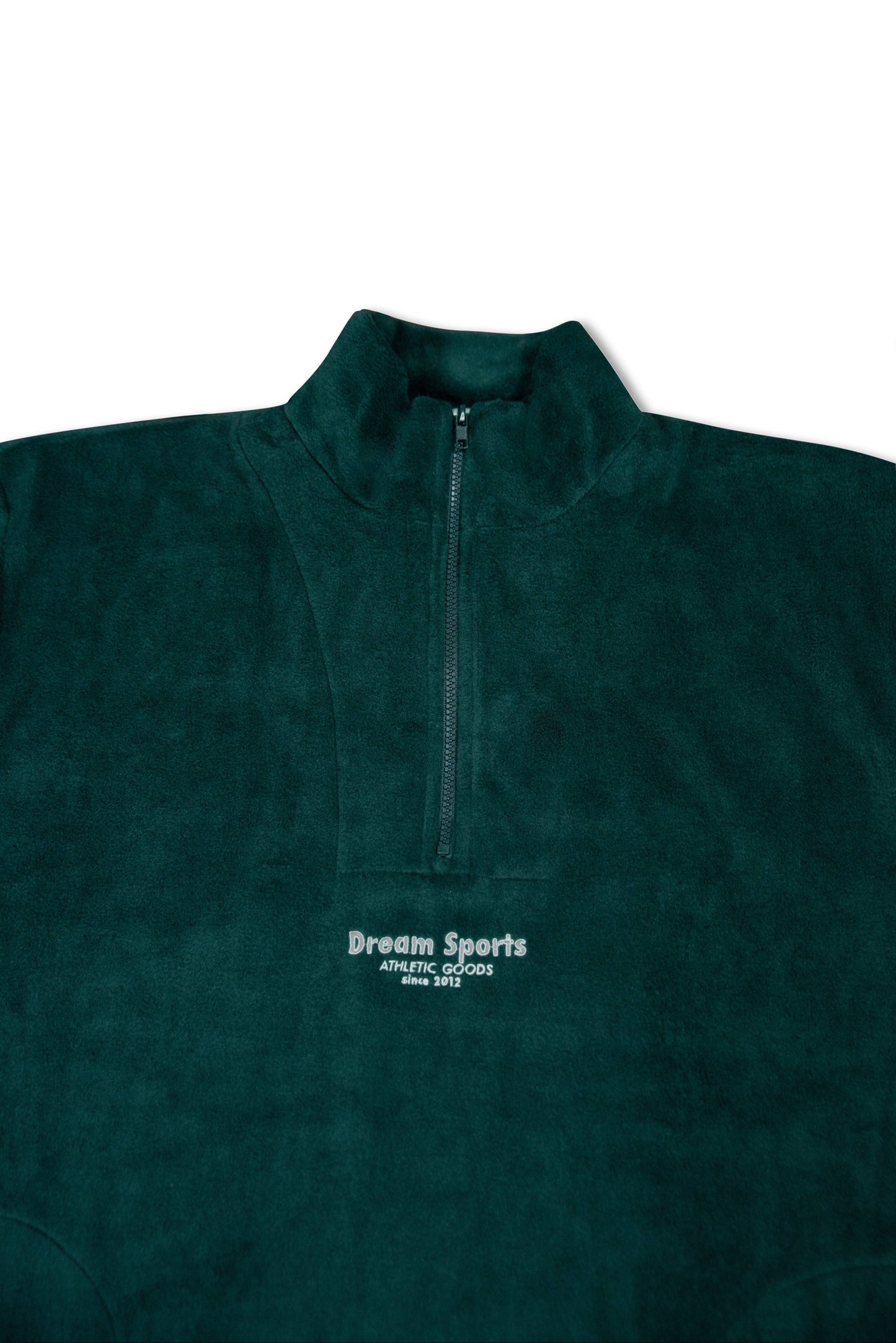 Close-up of forest green 1/4 zip fleece showing tonal Dream Sports logo embroidery and high collar design for added warmth and comfort.