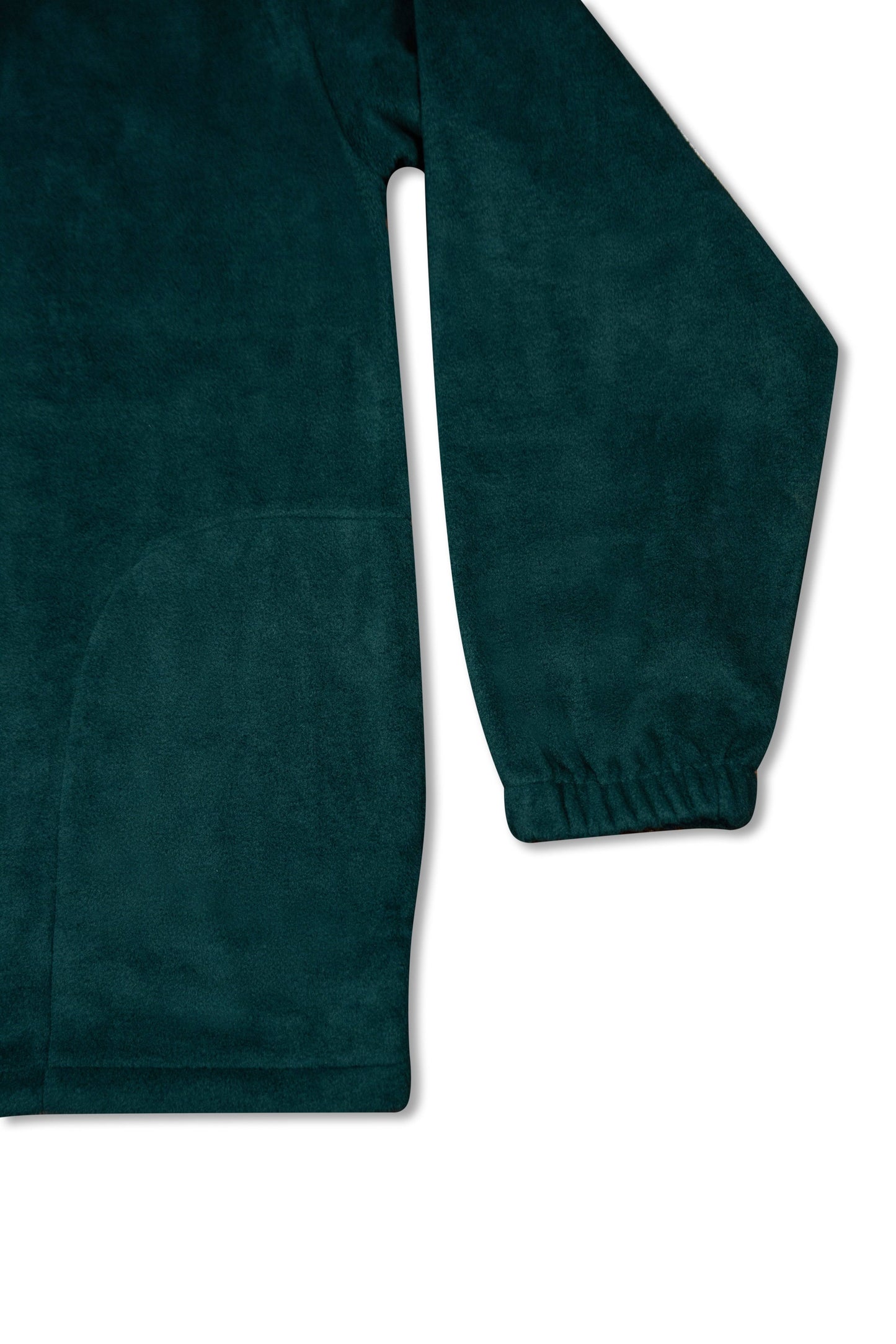Sleeve and pocket detail of forest green unisex zip fleece, showing elastic cuff and smooth fleece texture for relaxed fit and comfort.