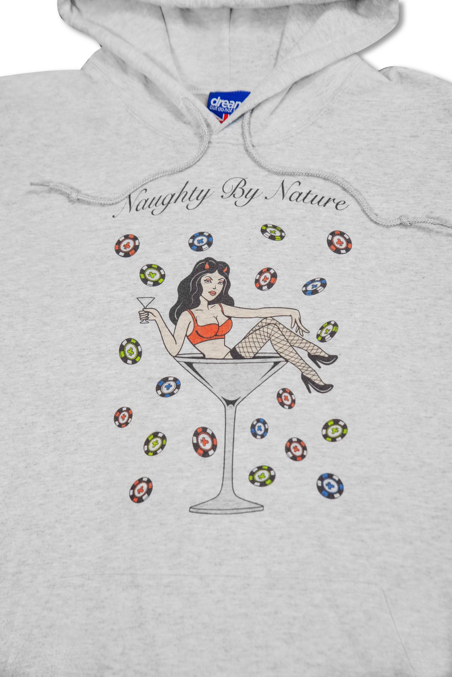 Close-up of Naughty By Nature graphic on Ash Grey Hoodie showing a retro-style woman in red top and fishnets inside a martini glass with poker chips.