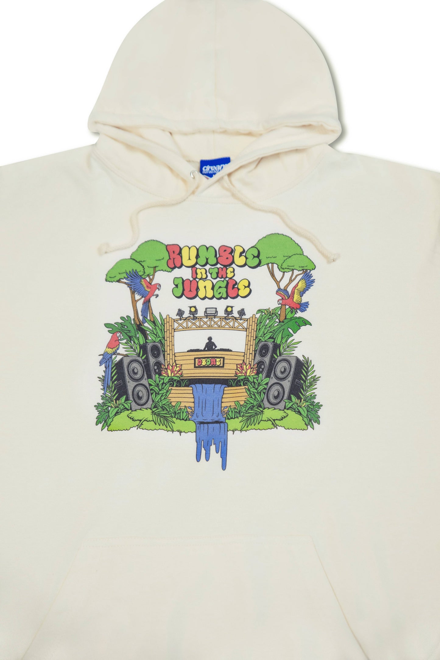 Close-up of Vanilla Cream Hoodie showing Rumble In The Jungle graphic with tropical DJ booth, parrots, and speakers on heavyweight cotton fabric.