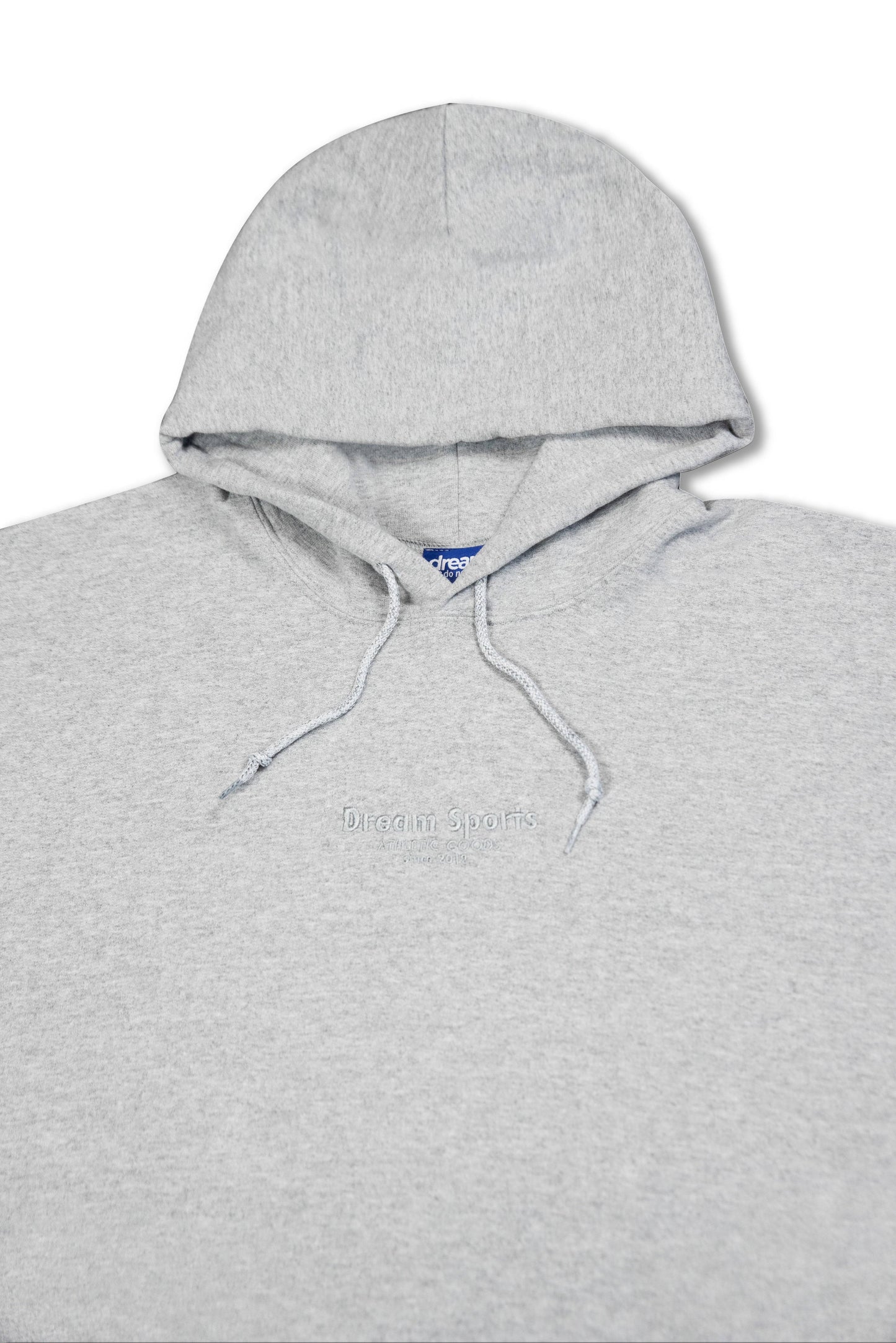 Close-up of hood and chest area on unisex grey hoodie showing Dream Sports tonal embroidery and drawstring detail.