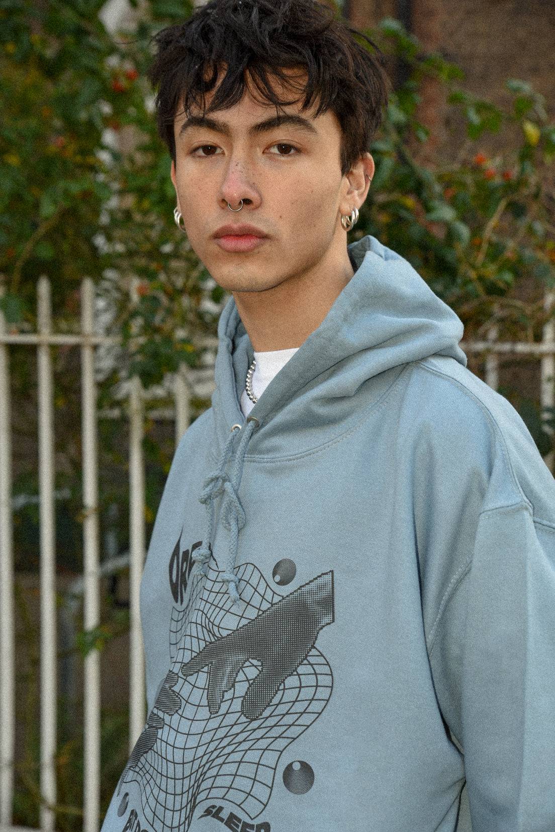 Hoodie in Dusty Blue with Sci Fi Rave Hands Print