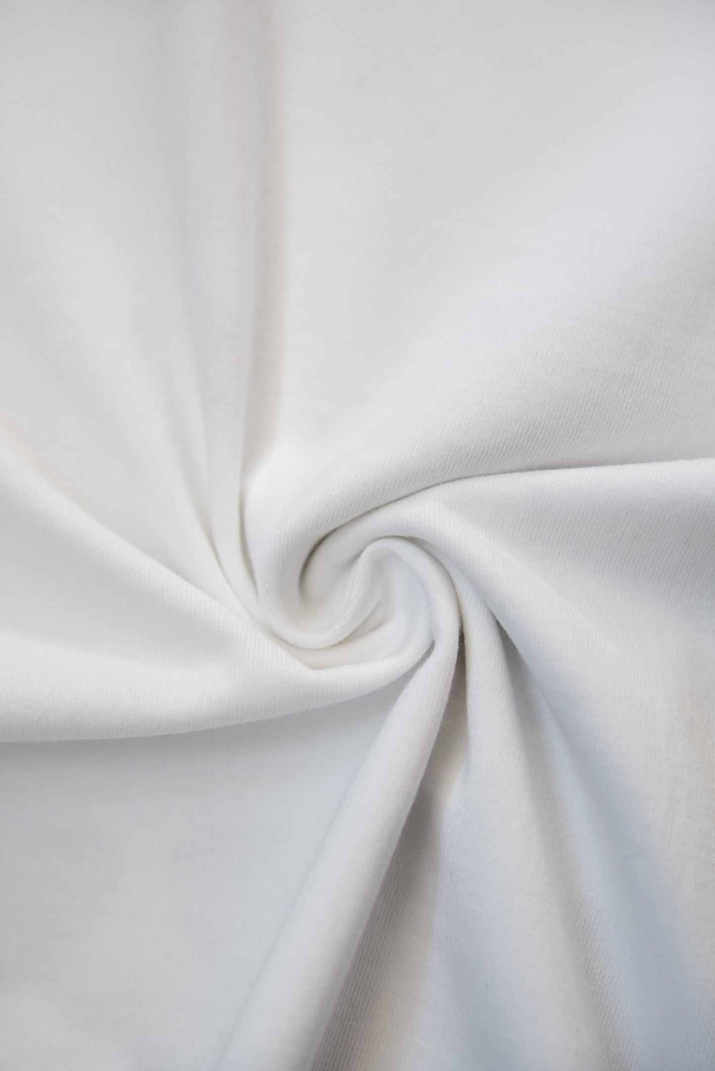 Close-up of High On Life T-Shirt fabric texture in white. Soft 240 gsm cotton material ensures comfort and durability for everyday wear.