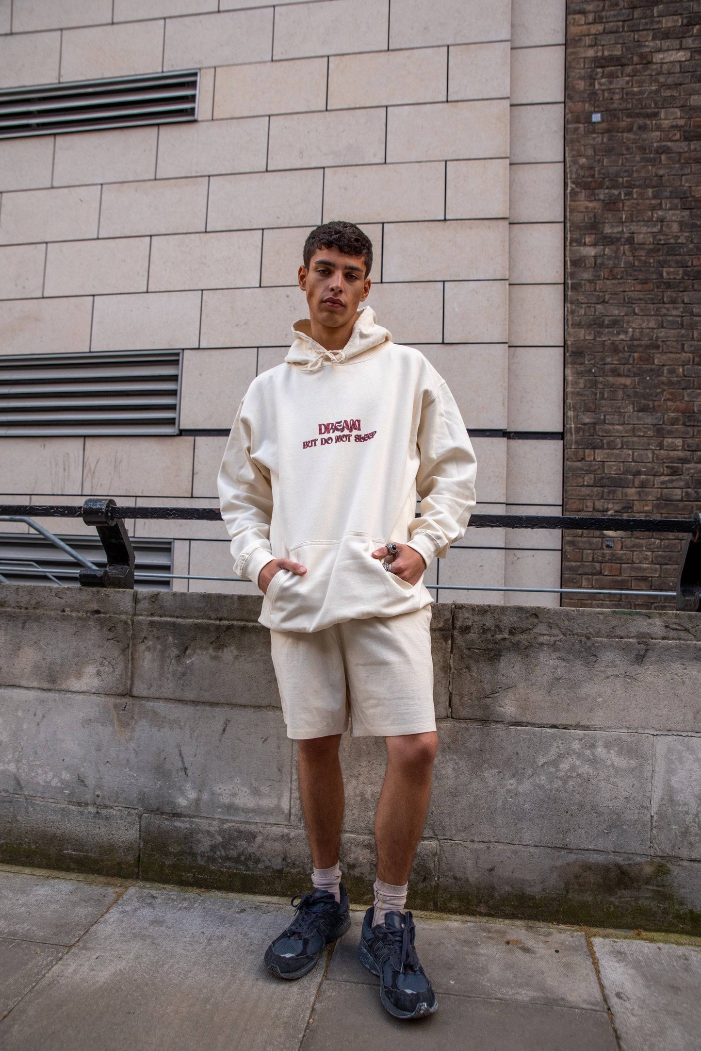Hoodie in Natural With Cursive Logo Print