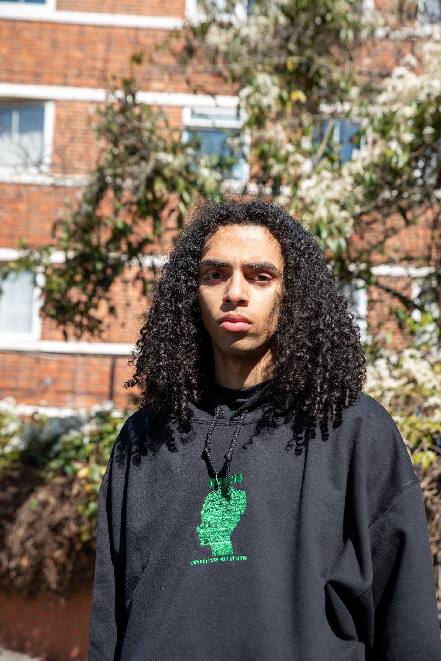 Hoodie in Black with Beyond The Veil Of Time Embroidery