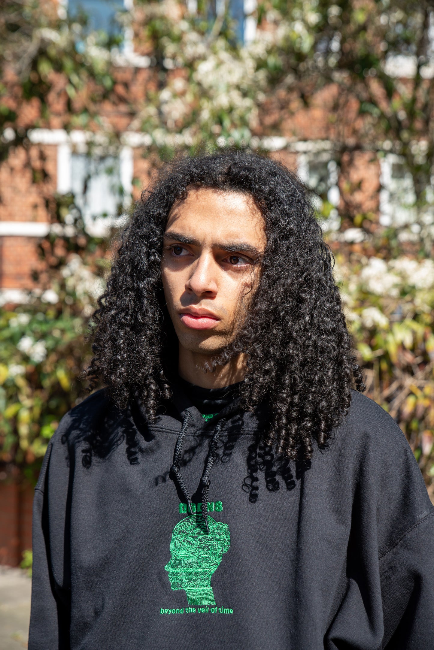 Hoodie in Black with Beyond The Veil Of Time Embroidery