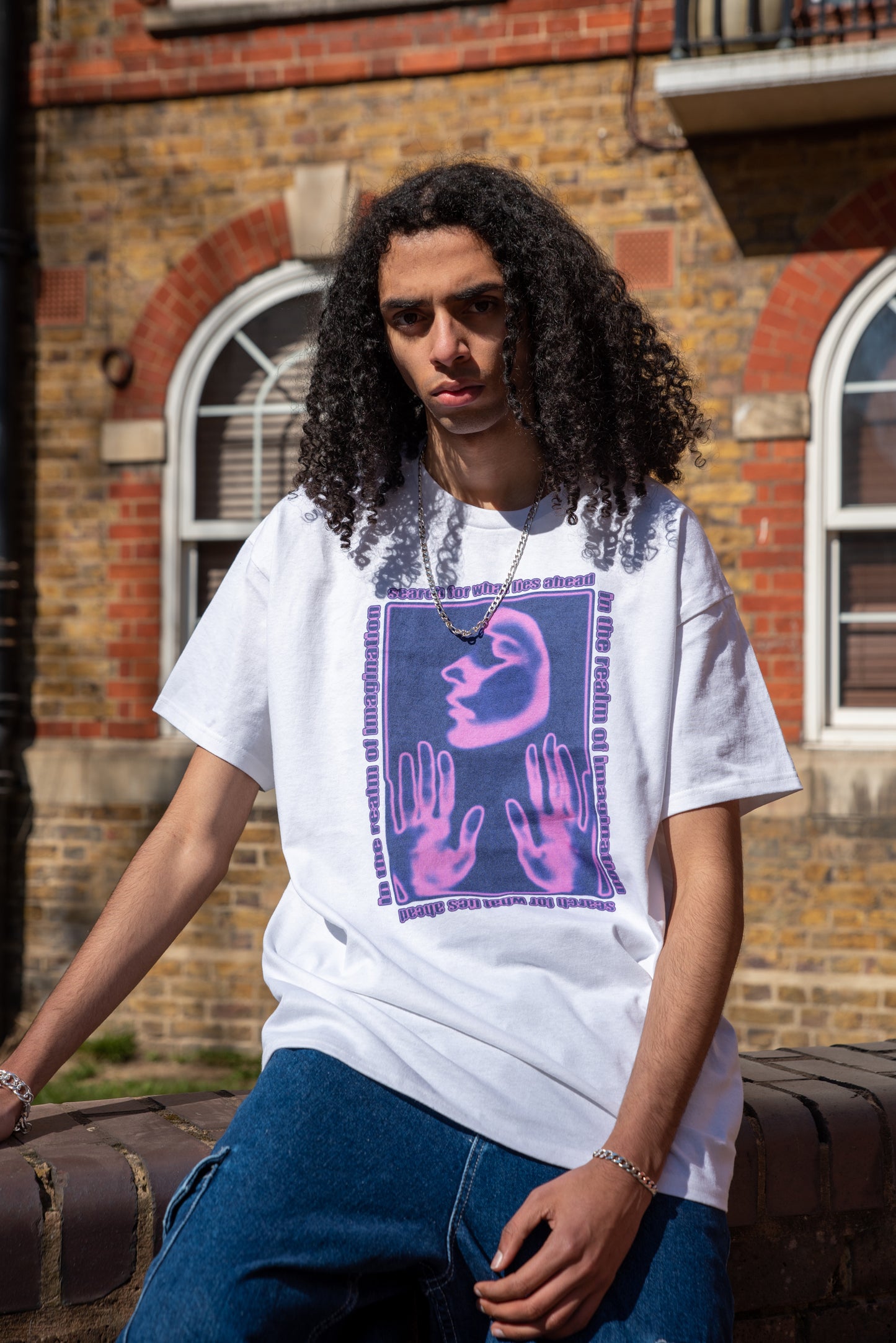 Short Sleeved T-shirt in White With The Realm Of Imagination Print Colour