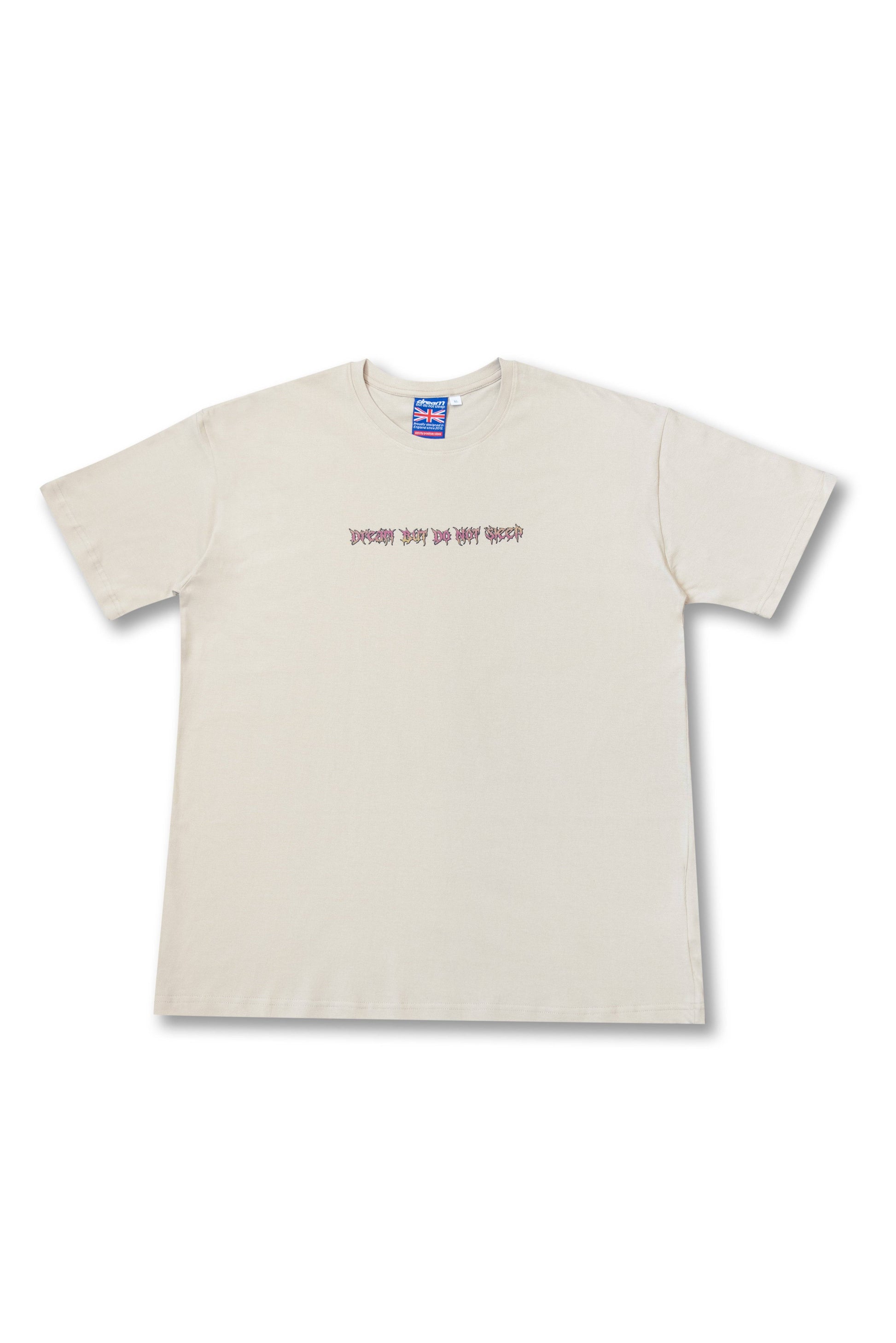 Front view of sand short sleeved t-shirt with small chest text reading 'Dream Next Do Not Sleep' in stylized font, perfect for casual wear.