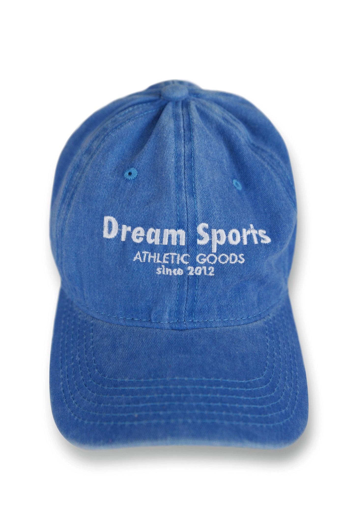 Front view of vintage light blue baseball cap featuring white embroidered Dream Sports logo, made from soft cotton with classic 6-panel structure.