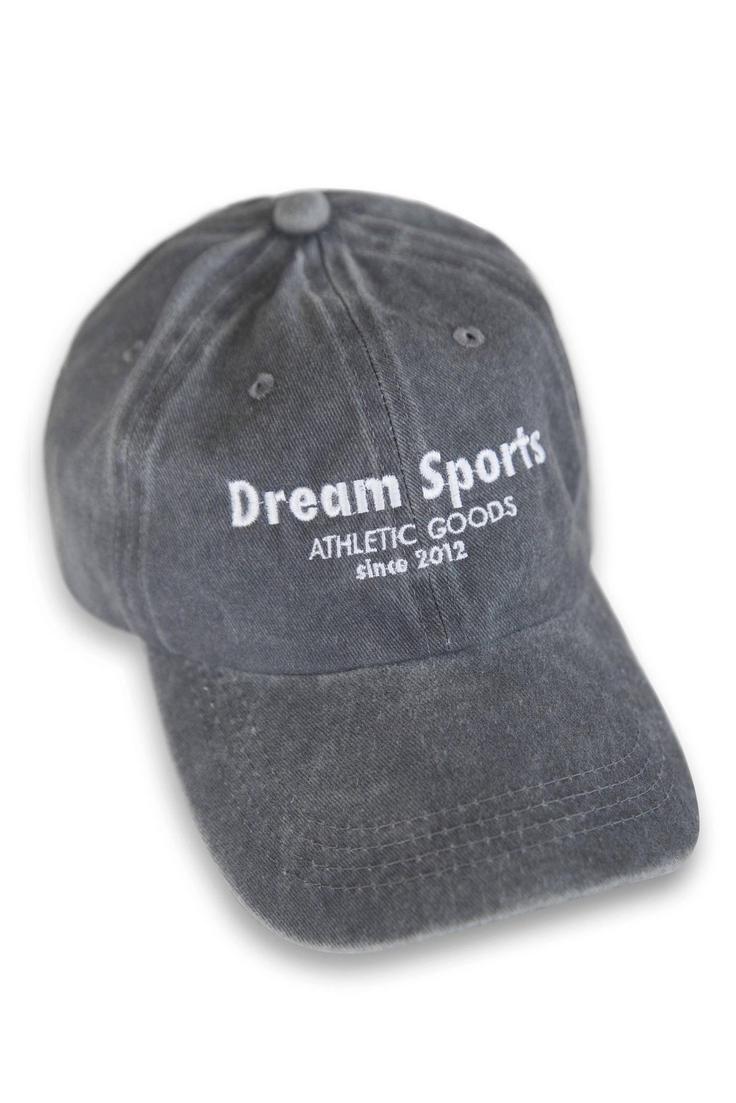 Vintage grey cap with Dream Sports logo in white embroidery, featuring a curved brim and soft cotton texture for casual wear.