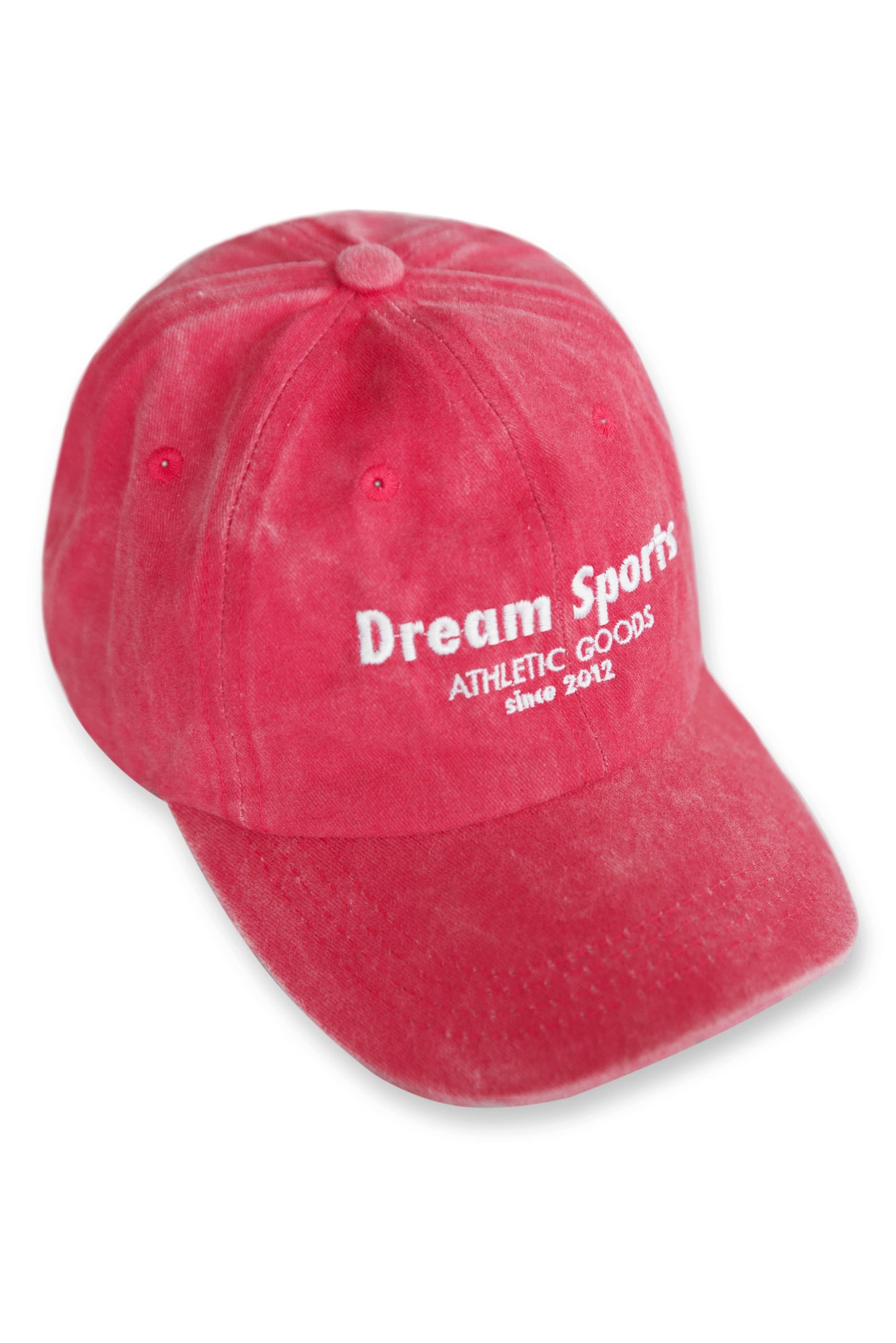 Vintage pink sports cap with white Dream Sports logo, curved brim, and soft washed finish. Ideal for casual athletic wear.