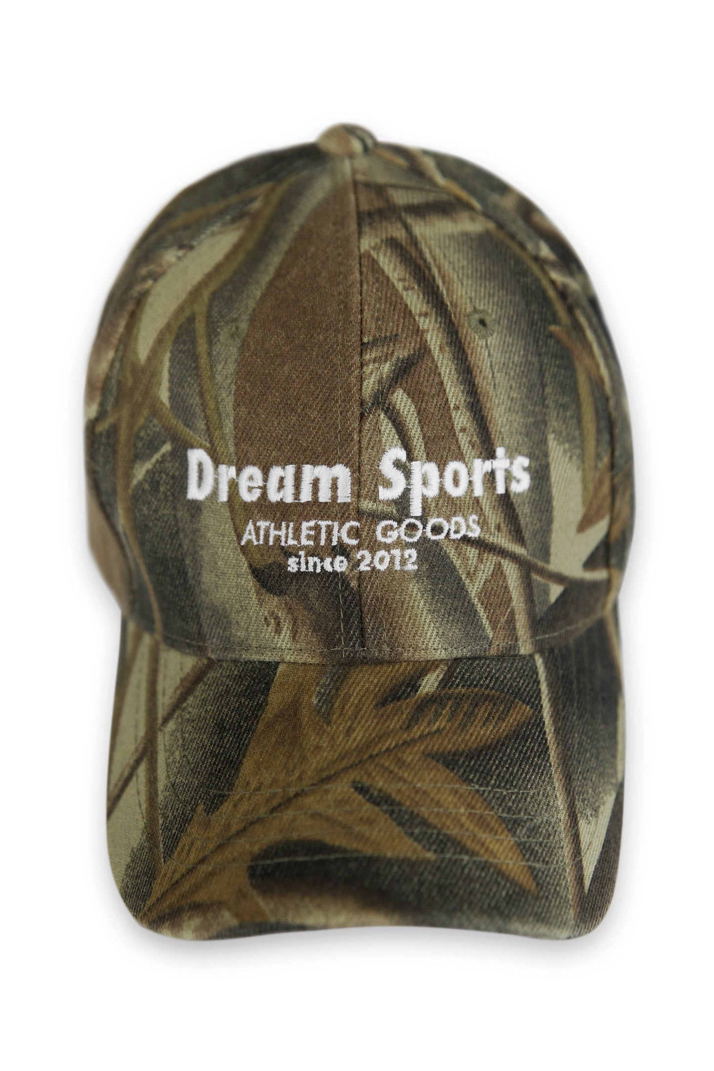 Front view of Real Tree Camo Cap showcasing Dream Sports logo and structured crown, ideal for athletic and casual wear.