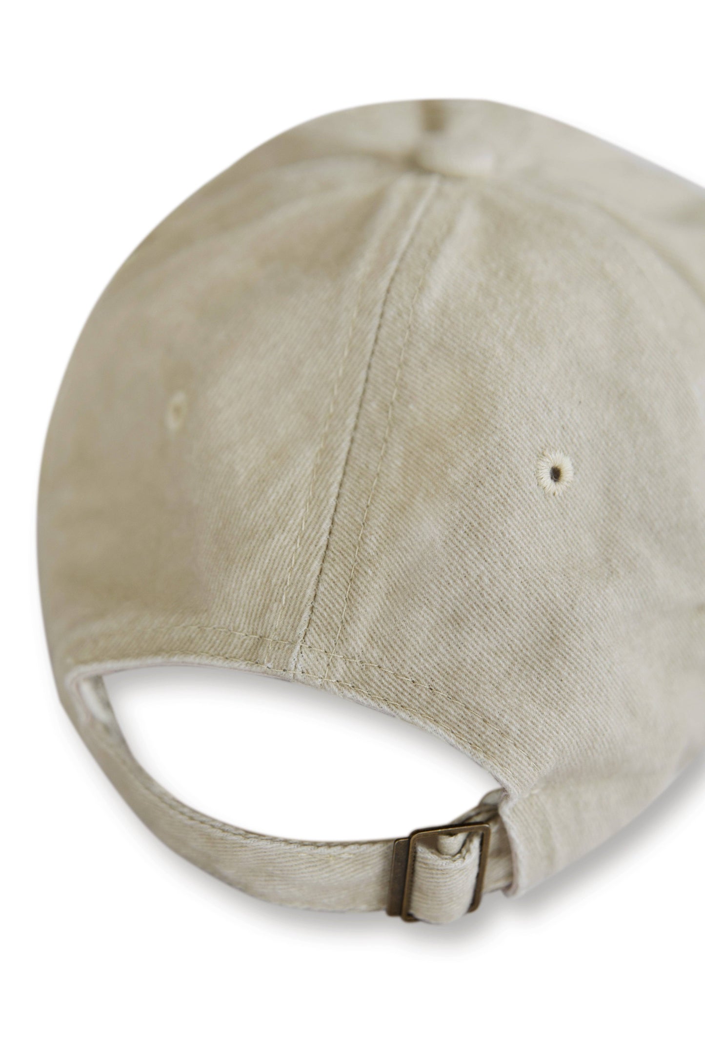 Back view of vintage beige sports cap showing adjustable strap with metal buckle. One-size-fits-most design for comfortable fit.