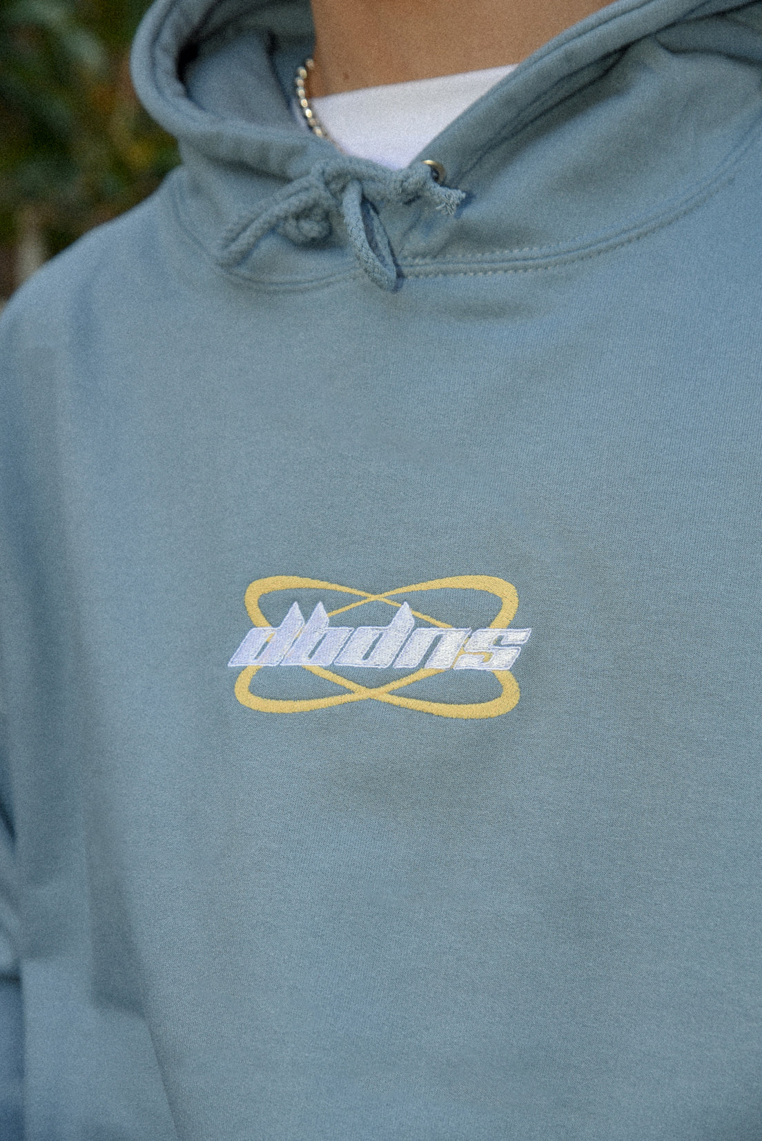 Hoodie in Dusty Blue with Futuristic Logo Embroidery