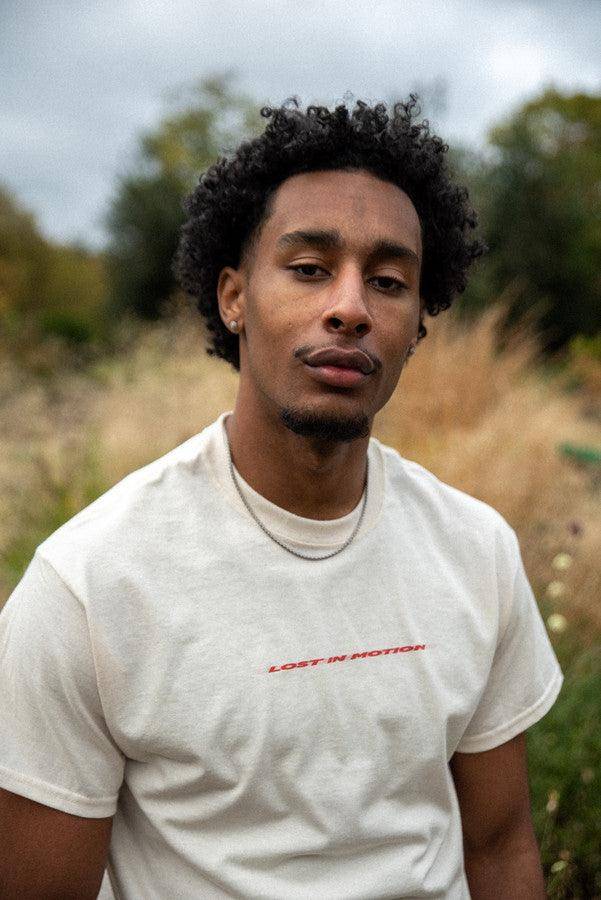 T-Shirt in Neutral With Lost In Motion Logo Print - Dreambutdonotsleep