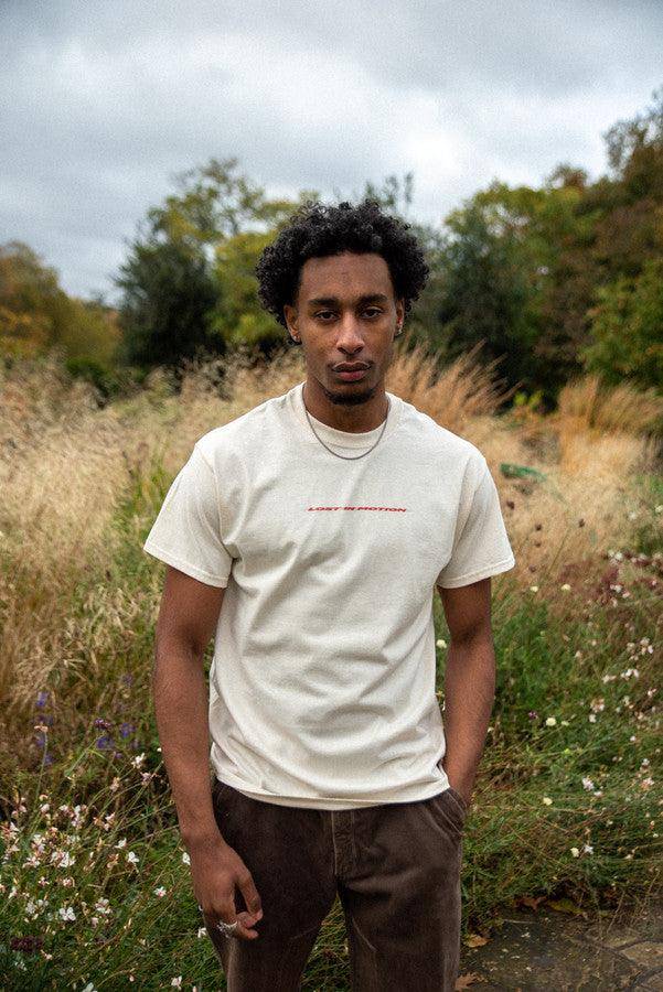 T-Shirt in Neutral With Lost In Motion Logo Print - Dreambutdonotsleep