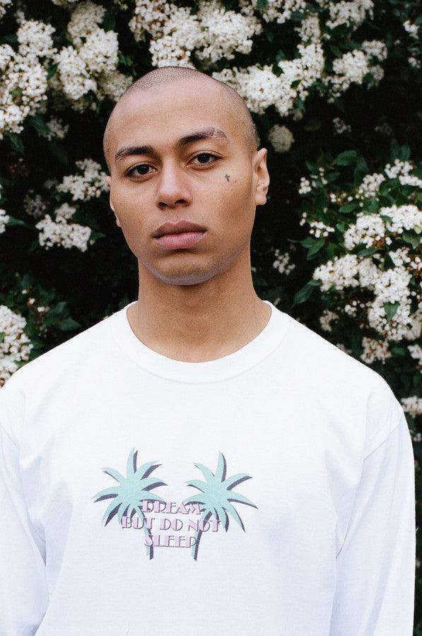 Long Sleeved T-shirt In White With Tropical Palm Tree Print - Dreambutdonotsleep