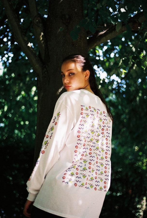 White Long Sleeved T-shirt With 80's Geometric Design.