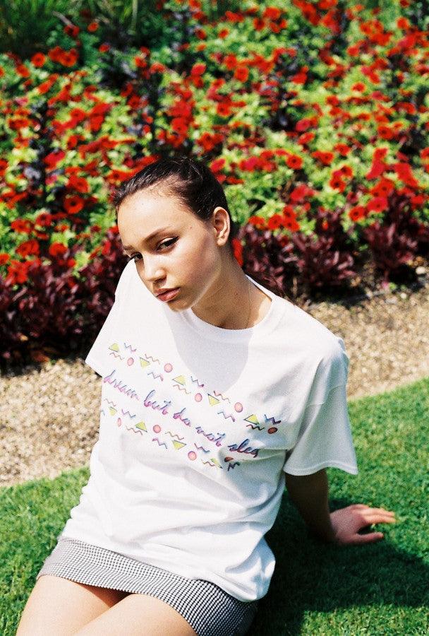 White Short Sleeved T-shirt With 80's Geometric Design.