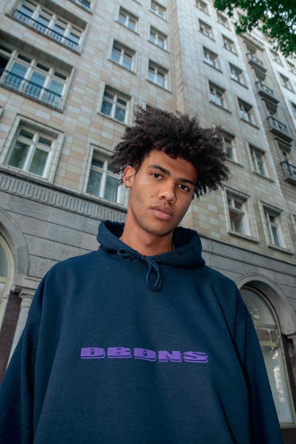 Hoodie in Navy with Purple Logo Embroidery