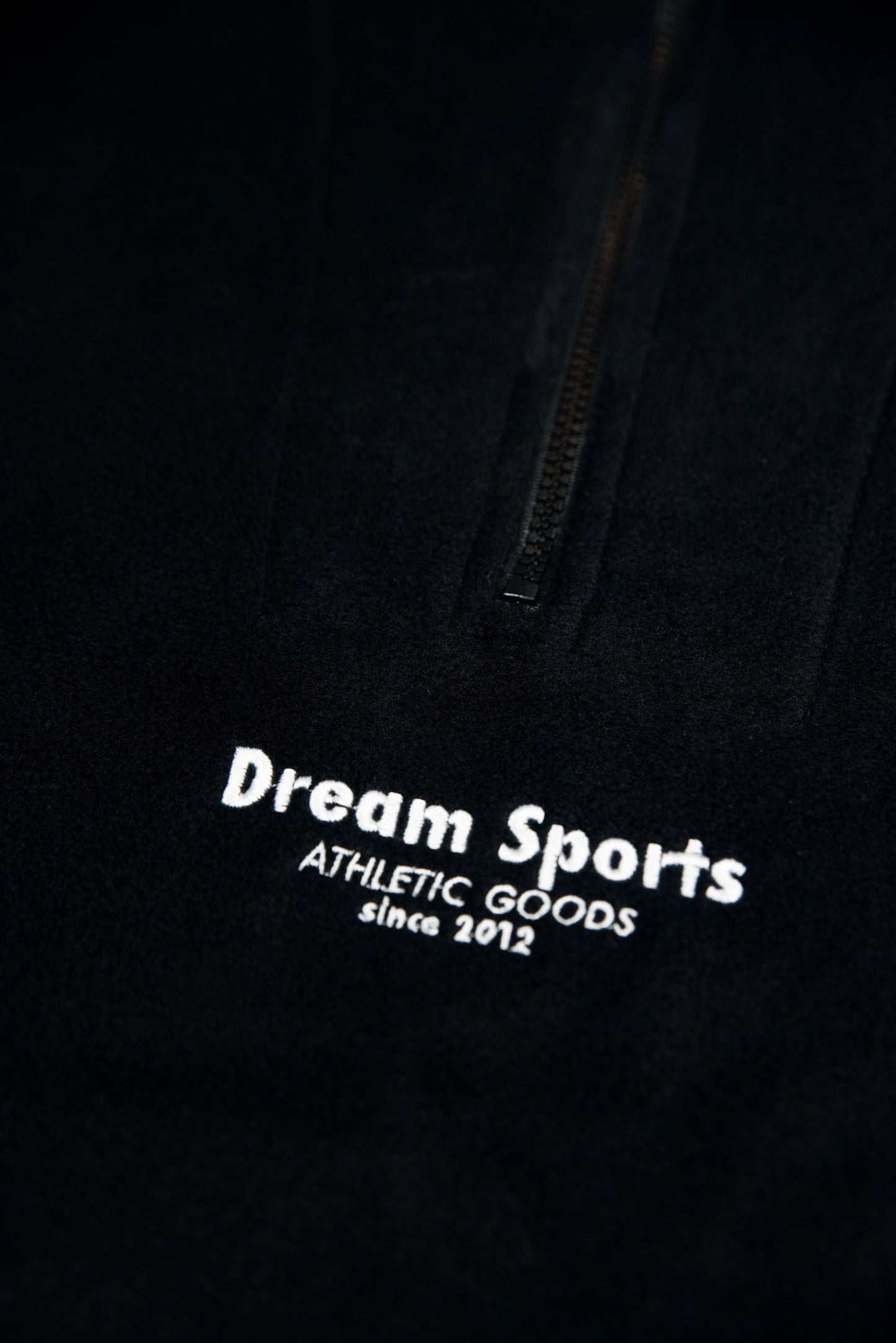 1/4 Zip Fleece in Black with Dream Sports Tonal Logo Embroidery