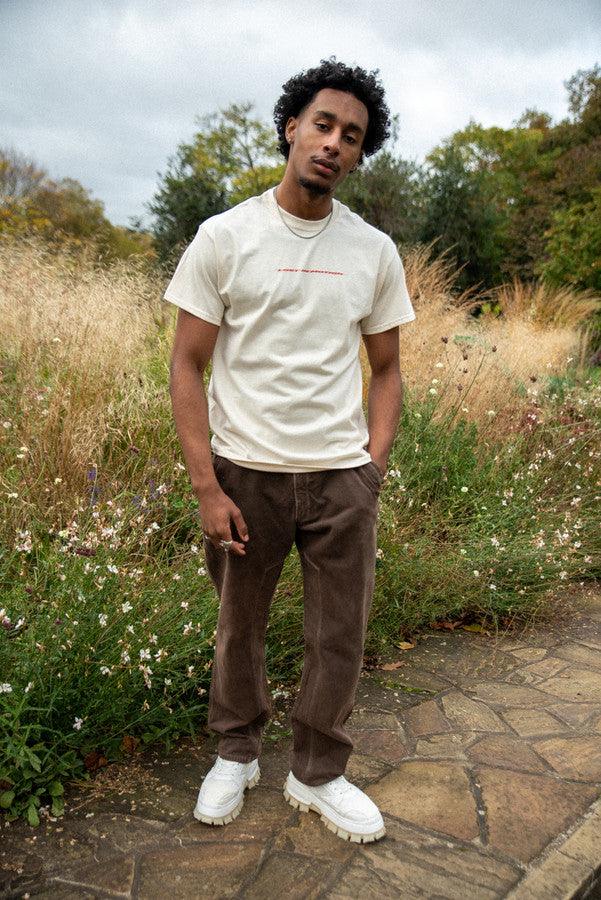 T-Shirt in Neutral With Lost In Motion Logo Print - Dreambutdonotsleep