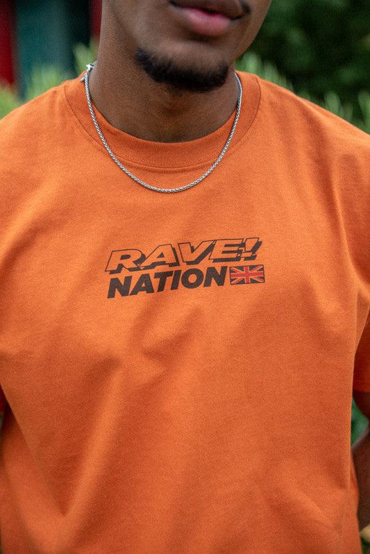 T-Shirt in Texas Orange With 90s Rave Smiley Positive Print - Dreambutdonotsleep