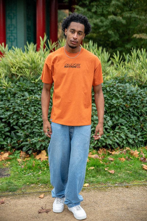 T-Shirt in Texas Orange With 90s Rave Smiley Positive Print - Dreambutdonotsleep