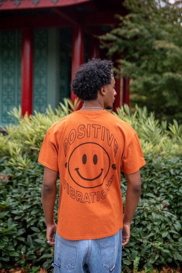 T-Shirt in Texas Orange With 90s Rave Smiley Positive Print - Dreambutdonotsleep