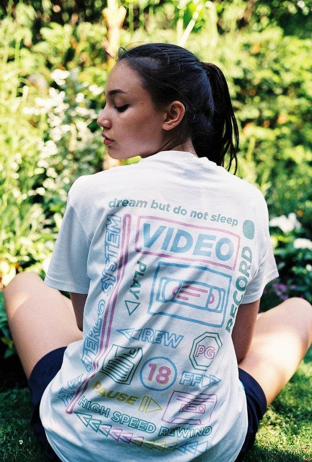 White Short Sleeved T-shirt With 80's VHS Design.